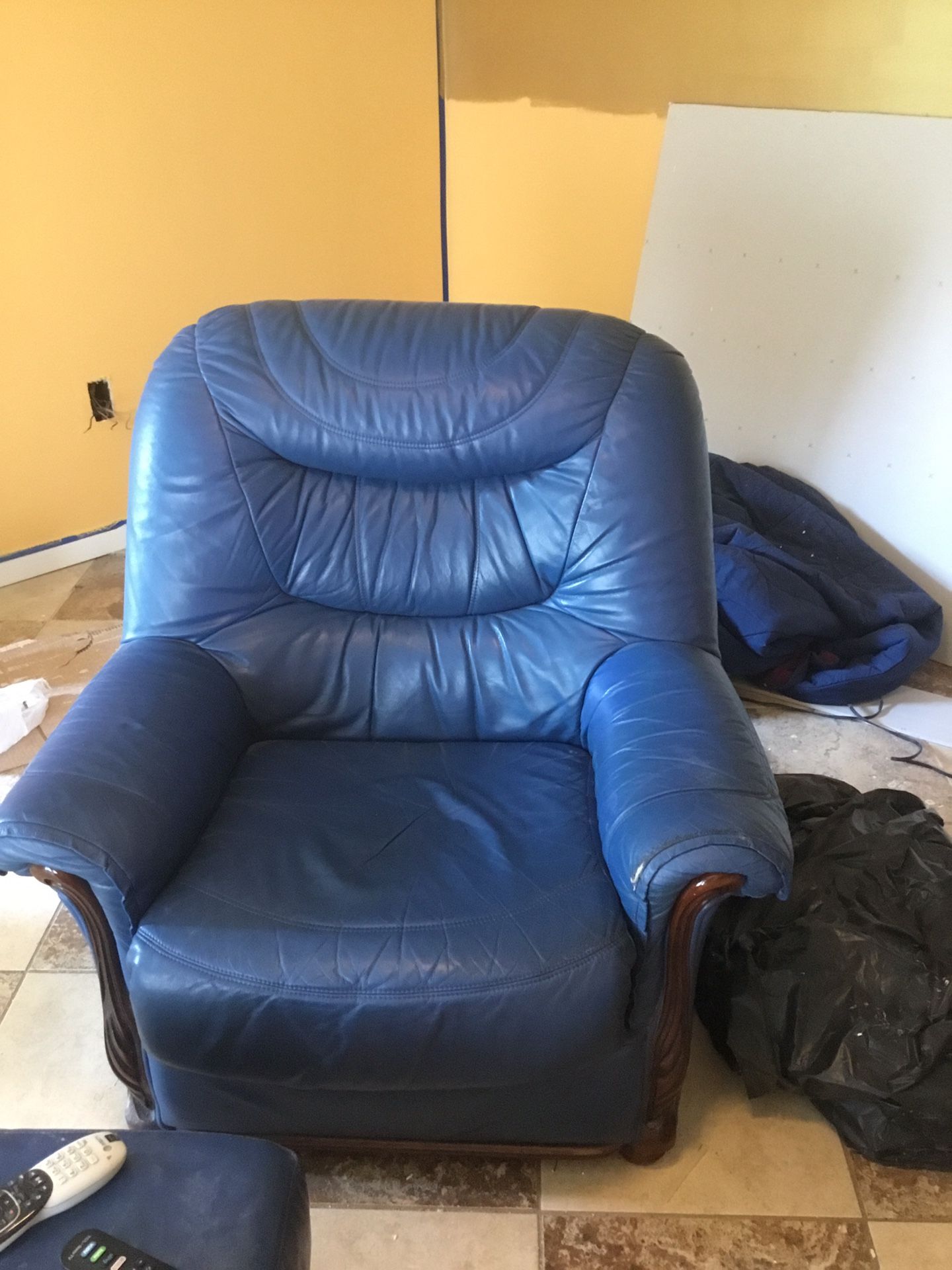 Very nice Italian leather chair, futon and area rug for sale. Make an offer!