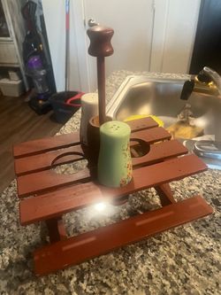 Picnics table condiment holder