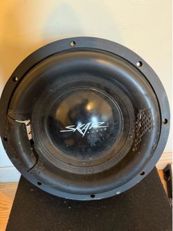 Skar Audio Subwoofer 2500 watt. Lots of wear and tear, but she still dumps.