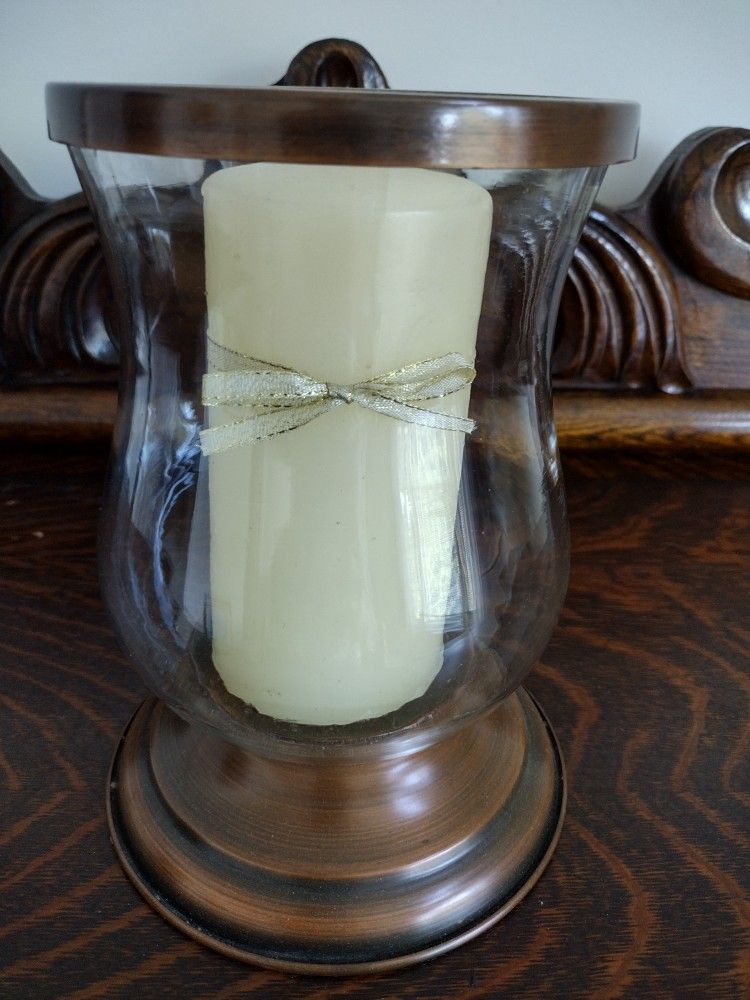Pillar Candle In A Hurricane Glass