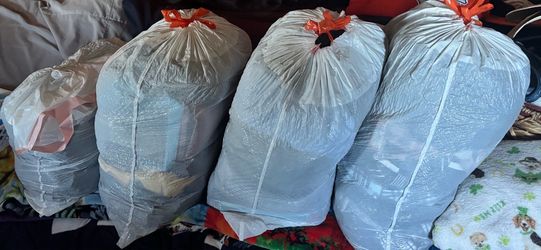 3 bags of 3XL and 4XL mens tops and 1 bag of mens bottoms