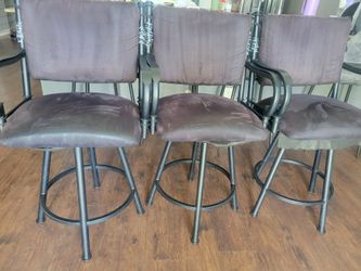 Wrought iron swivel high chairs