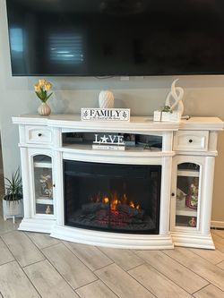Tv entertainment center with fireplace