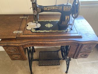 White Rotary USA Antique pedal sewing machine and cabinet