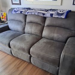 Grey couch recliner  approx. 82" Width