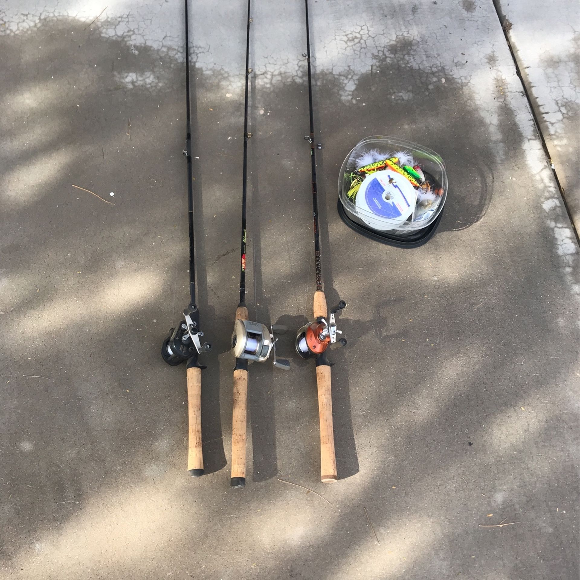 3 Fishing Poles and Misc Hooks and Line
