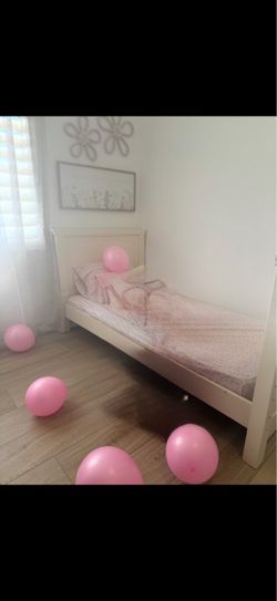 Two twin size beds with frames (no mattress)