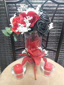 Set price $40 very beautiful Red/ Black/ White flowers in plastic vase with matching boutonniere & (2) red candles + (2) candle holders.