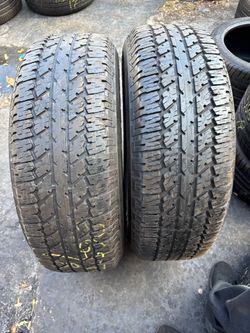 Set of 2 nice Bridgestone Dueler 265/70/18 ( We install & balance)
