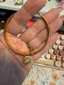 Beautiful gold Coach Bangle