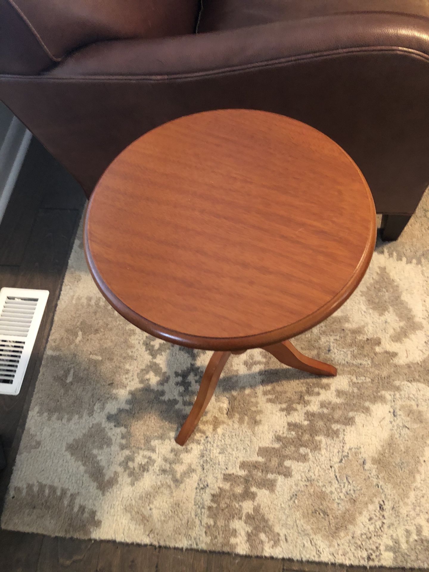Round wood side table
