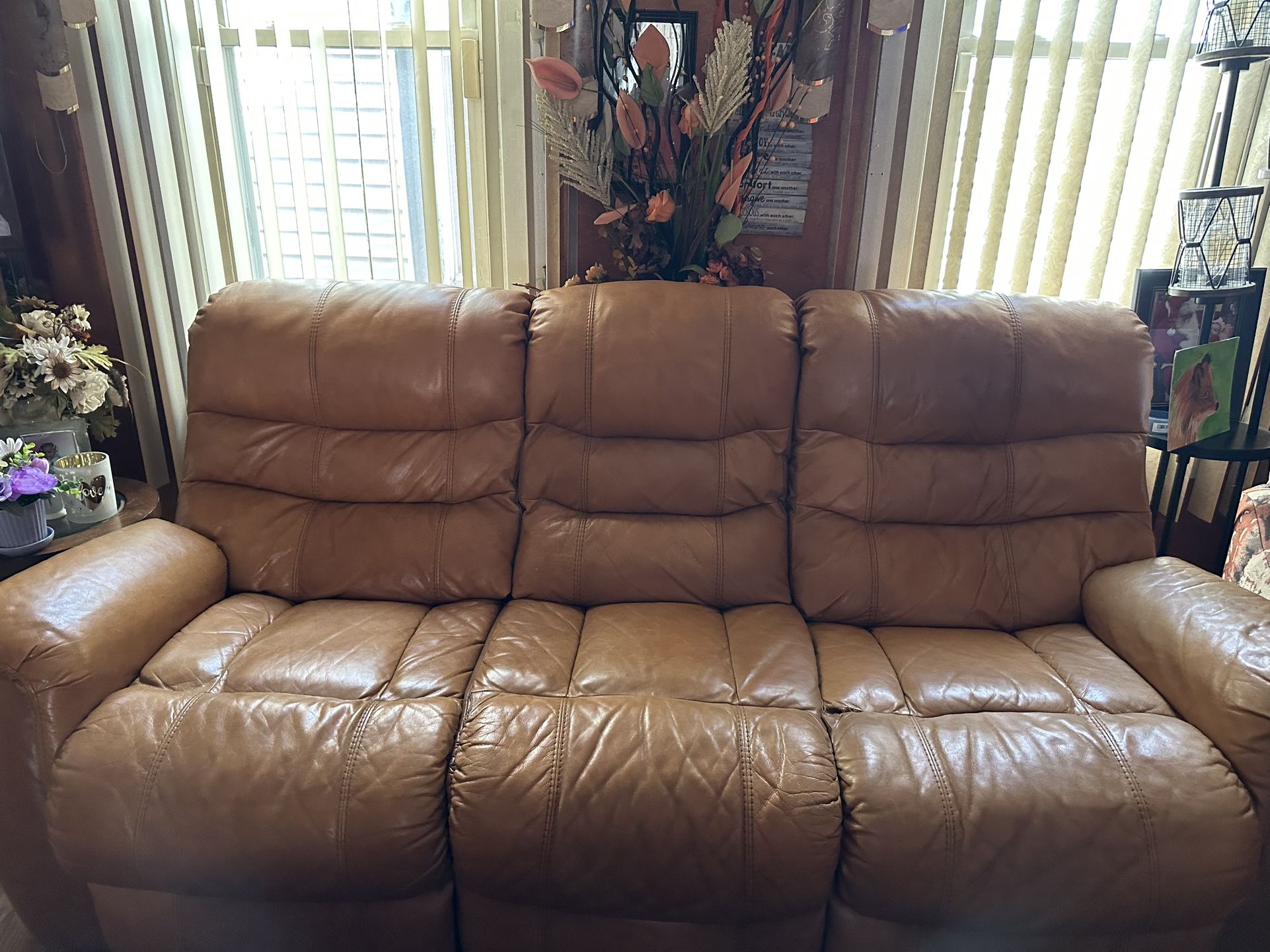 A Very Nice Powered Leather Couch.