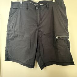 Grey cargo shorts with zipper pockets