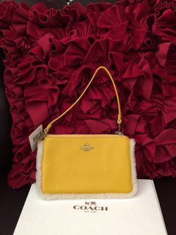 NWT coach leather wristlets