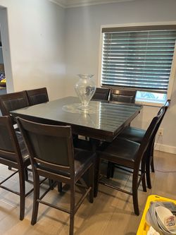 Wood table )tempered glass top/8 chairs )