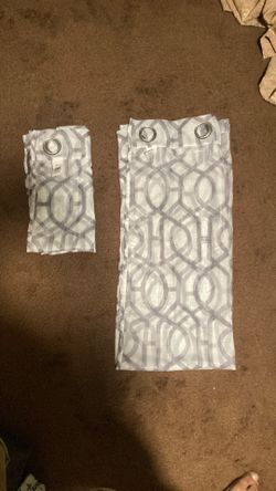 Brand new set (2) of grey curtains with hooks 27.5 inches into 63 inches