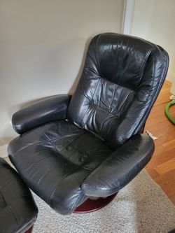 Leather recliner with leather foot rest