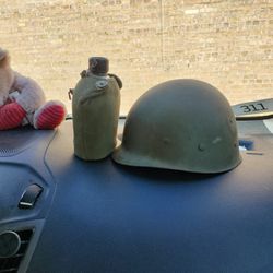 soldier helmet and water bottle  