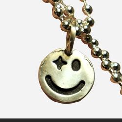 999 Silver Starry Eyed Charm / Amulet / Pendant 

- 15mm

- New 

- Unisex

 - 1.10g in weight 

Soldered o ring for extra durability 

999 Fine Silve