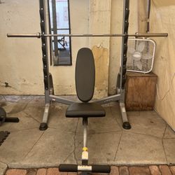 Hoist Weight Bench, Hampton Bumper Plates And Olympic Bar. 
