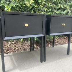 A Pair of Black Nightstands