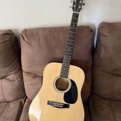 Selling a gently used Squier by Fender acoustic guitar