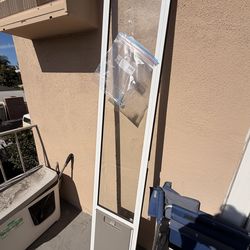 Glass and metal doggy / cat door