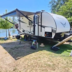 2021 RV IN PERFECT CONDITION NICE AND CLEAN SUPER EQUIPPED,MICROWAVE, REFRIGERATOR,STOVE,GRILL,QUEEN BED,TWIN BED,STORAGE, SLIDE SIDES,AC,HEATER,SHOWE