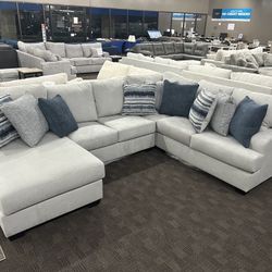 Big Light Grey Sectional With Pillows