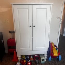 White armoire with removable shelves