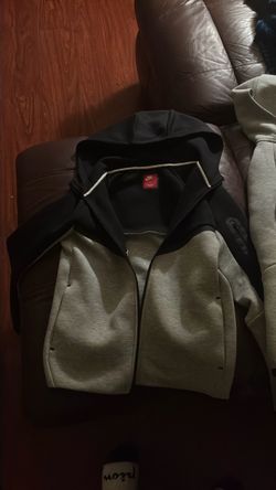 ONE large black and gray Nike tech and gray Nike tech medium only pick up 180 for both or 80 for medium and 100 for black one or shoot offers looking 