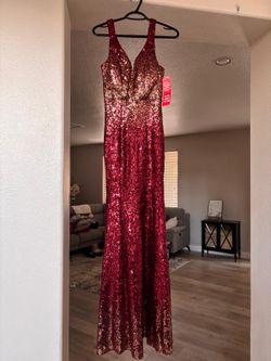 New burgundy and gold sequence dress