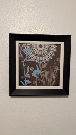 Michael Marcon, Botanical Silhouettes II-Features a brown background with blue and white botanical silhouettes and a semi-circular decorative mandala