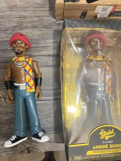 The Outkast Andre 3000 (Ms. Jackson) 12-Inch Vinyl Gold Figure is a collectible figure