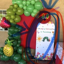 A hungry caterpillar turns one backdrop