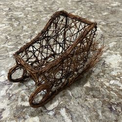 Handcrafted wicker Basket Shaped As Sleigh