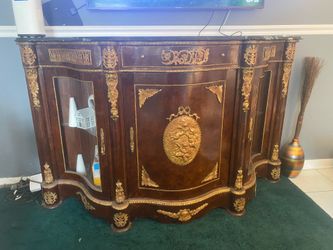 Vintage cabinet with marble top.