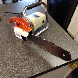 VINTAGE. SEARS ELECTRIC CHAIN SAW. 12 " BAR WILL TAKE  A16" BAR. VERY GOOD CONDITION. 95. DOLLARS