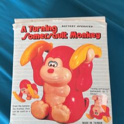 A turning Somersault Monkey Vintage 80s toy