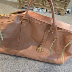 Light Pink Duffle Bag With Clothes Hanging Option