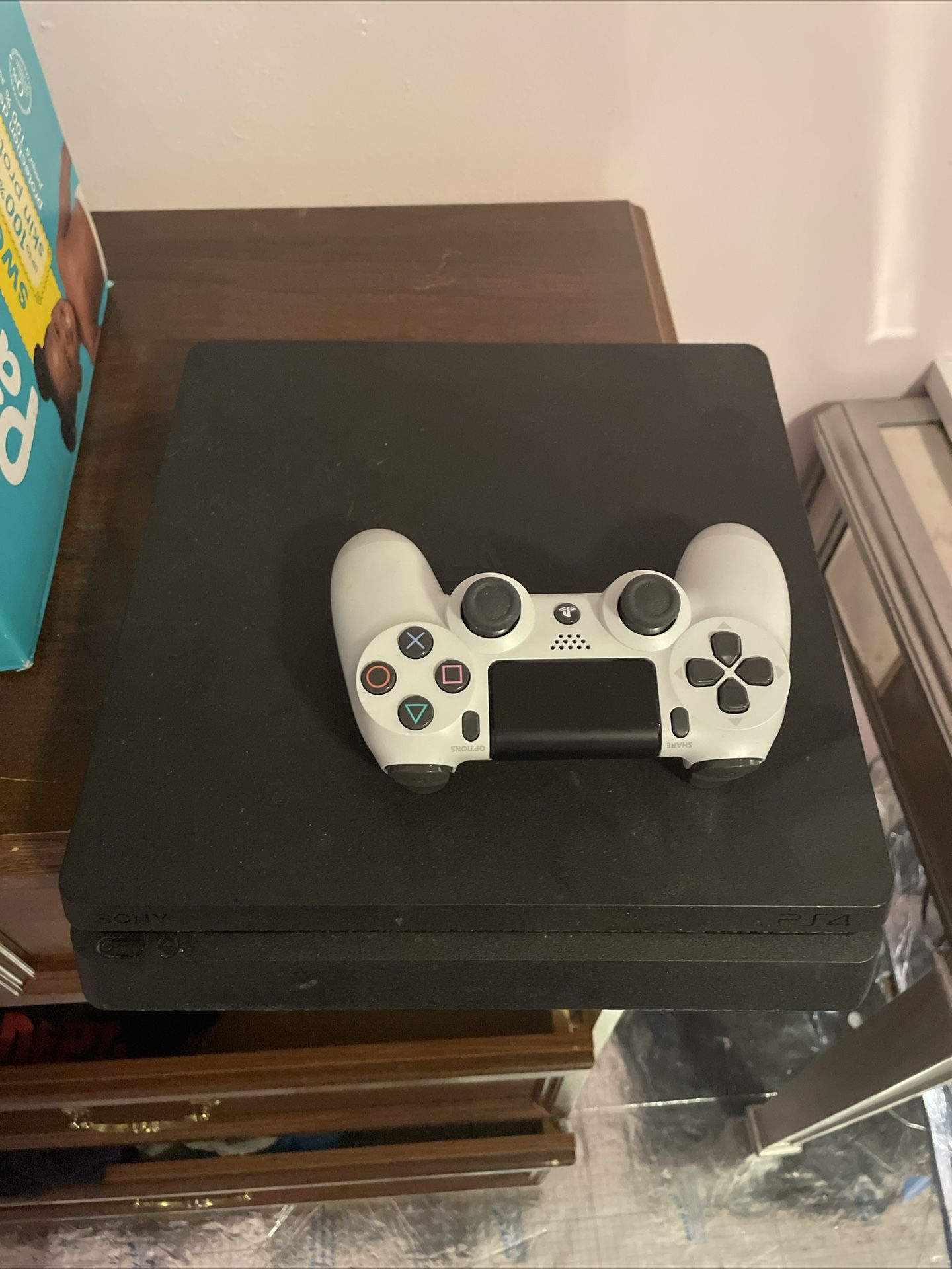 PS4 w/ white Controller Used 