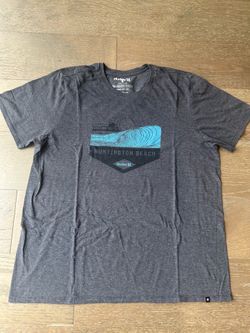 Hurley Men's Huntington Beach Graphic Tee - Charcoal with Blue Wave size XXL Hurley short-sleeve T-shirt with a coastal wave graphic. Classic crew nec