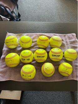12- Rawlings Fastpitch Softballs (9s-10s-11s)