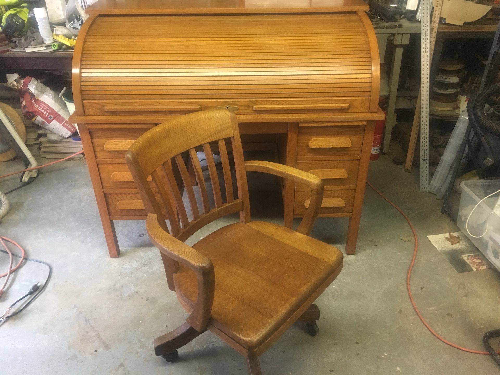 Antique rolltop desk and chair.