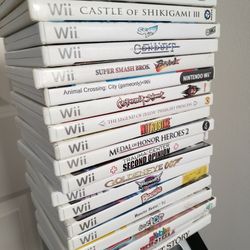 Nintendo Wii Game Lot w/ Display Stand