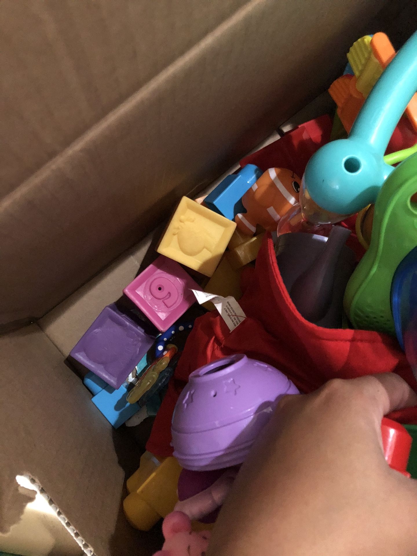 box of baby/toddler toys