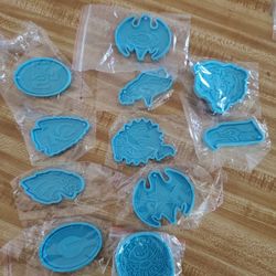 SILICONE KEY CHAIN MOLDS.  LOT OF 11. 4.00 EACH