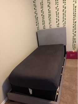 Twin XL bed with mattress and box spring