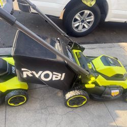 Lawnmower ryobi push 21 inch blade , fast charger come w 6ah battery   like new 