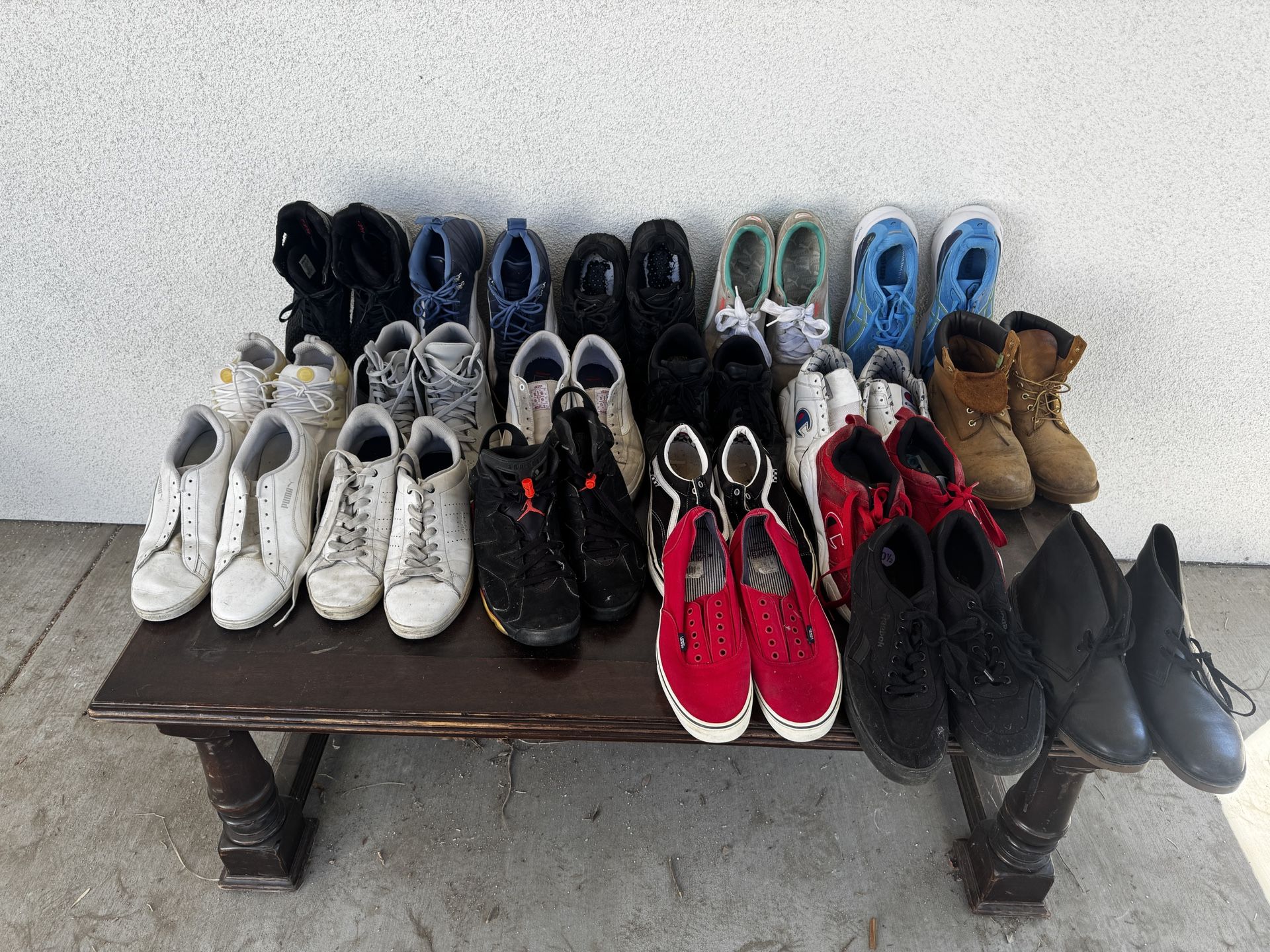 19 pairs of Men Sneakers, shoes, and boots ranging in size from 9-12 Shoes sold as is Pumas Hilfiger Vans Jordans Timberlands And More $55 OBO